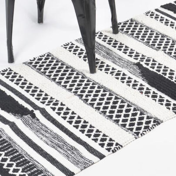 Qalara Handwoven cotton monochrome paneled rug 58' X 27'